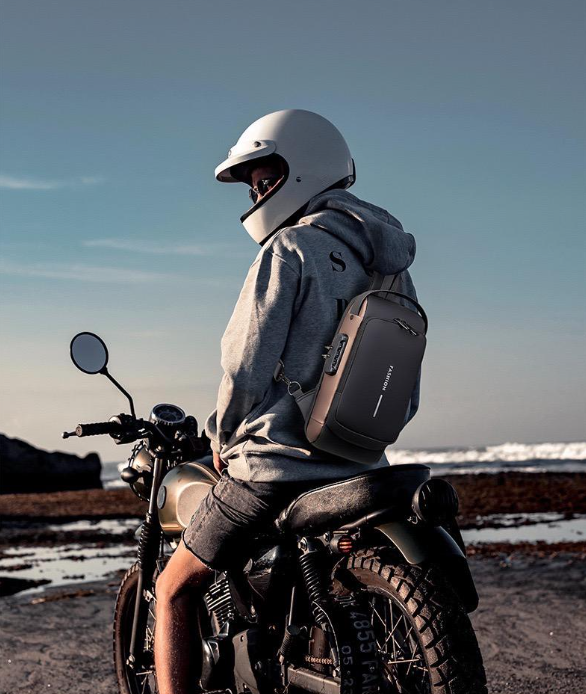 Bolso Antirrobo impermeable con cargador para tablet o celular